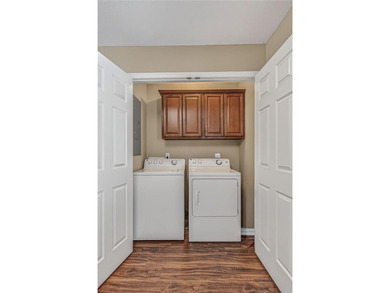 This 2-bedroom, 1.5-bathroom condo overlooks the pristine waters on Holiday Island Executive Golf Course in Arkansas - for sale on GolfHomes.com, golf home, golf lot