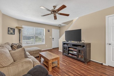 This 2-bedroom, 1.5-bathroom condo overlooks the pristine waters on Holiday Island Executive Golf Course in Arkansas - for sale on GolfHomes.com, golf home, golf lot