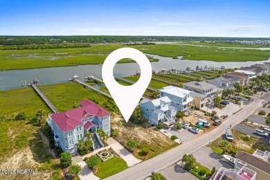 Enjoy stunning views from this Jinx Creek waterfront lot, with on Sea Trail Golf Resort in North Carolina - for sale on GolfHomes.com, golf home, golf lot