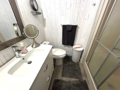 his beautifully updated 2-bedroom, 2-bathroom home offers 1,100 on Crystal Lake Club in Florida - for sale on GolfHomes.com, golf home, golf lot