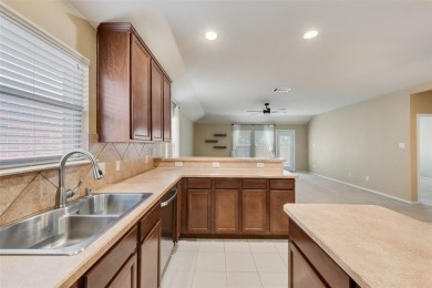 Step into this delightful north-facing 3-bedroom, 2-bathroom on WestRidge Golf Course in Texas - for sale on GolfHomes.com, golf home, golf lot