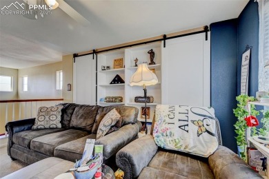 Welcome Home to Your Own Slice of Paradise! This stunning on Antler Creek Golf Course in Colorado - for sale on GolfHomes.com, golf home, golf lot