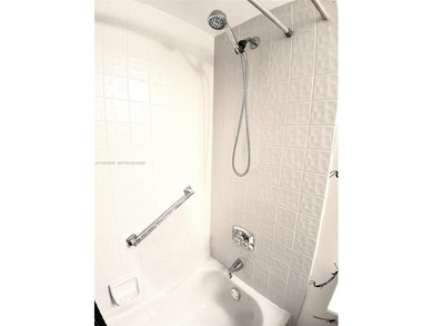 ORIGINAL CONDITION, FULLY FURNISHED 2/2 2nd Floor Inside Corner on Sunrise Lakes Phase IV Golf Course in Florida - for sale on GolfHomes.com, golf home, golf lot