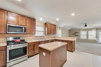 Step into this delightful north-facing 3-bedroom, 2-bathroom on WestRidge Golf Course in Texas - for sale on GolfHomes.com, golf home, golf lot