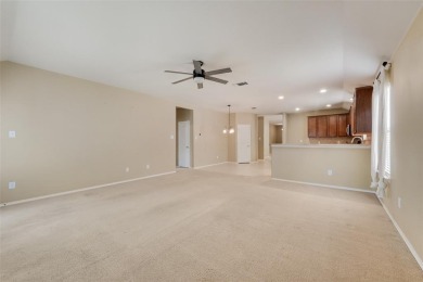 Step into this delightful north-facing 3-bedroom, 2-bathroom on WestRidge Golf Course in Texas - for sale on GolfHomes.com, golf home, golf lot