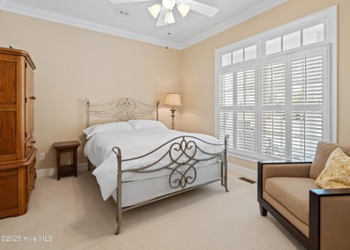 Overlooking the lush 10th fairway, this beautifully maintained on Porters Neck Country Club in North Carolina - for sale on GolfHomes.com, golf home, golf lot