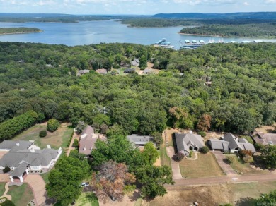 This 3-bedroom, 3-bath 1-level home on Ridge Road at Eden Isle on Red Apple Inn and Country Club in Arkansas - for sale on GolfHomes.com, golf home, golf lot