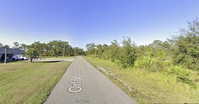 Come build your forever home on this one-half acre CANAL lot on Indian Lake Estates Golf and Country Club in Florida - for sale on GolfHomes.com, golf home, golf lot