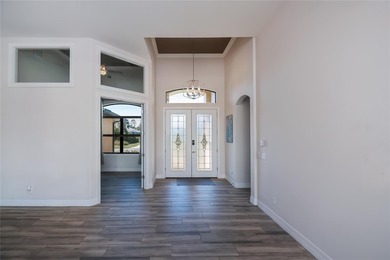 Exquisite 2021 custom-built DM Dean residence on a fully fenced on Rotonda Golf and Country Club The Palms Course in Florida - for sale on GolfHomes.com, golf home, golf lot