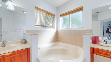 Welcome to this turnkey two-story home located in the luxurious on Keys Gate Golf Club in Florida - for sale on GolfHomes.com, golf home, golf lot