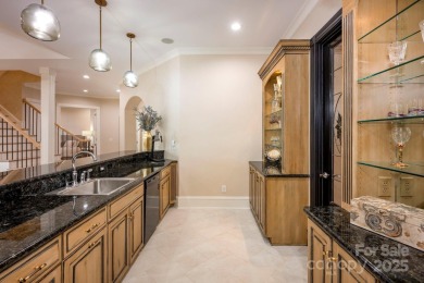 Extraordinary French Provincial-style home blends timeless on Trump National Golf Club Charlotte in North Carolina - for sale on GolfHomes.com, golf home, golf lot