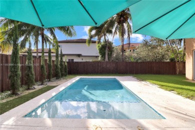 Welcome to this turnkey two-story home located in the luxurious on Keys Gate Golf Club in Florida - for sale on GolfHomes.com, golf home, golf lot