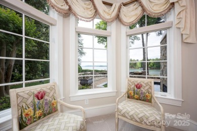 Extraordinary French Provincial-style home blends timeless on Trump National Golf Club Charlotte in North Carolina - for sale on GolfHomes.com, golf home, golf lot