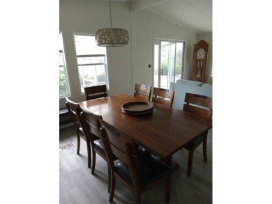 Beautiful cozy waterfront home in Village green Community.  This on Vista Plantation Golf Club in Florida - for sale on GolfHomes.com, golf home, golf lot