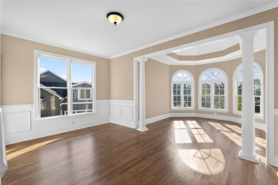 Located in BridgeMill, this well-maintained home offers the on Bridgemill Golf Club in Georgia - for sale on GolfHomes.com, golf home, golf lot