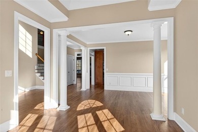 Located in BridgeMill, this well-maintained home offers the on Bridgemill Golf Club in Georgia - for sale on GolfHomes.com, golf home, golf lot