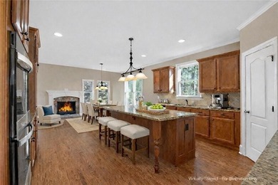 Located in BridgeMill, this well-maintained home offers the on Bridgemill Golf Club in Georgia - for sale on GolfHomes.com, golf home, golf lot