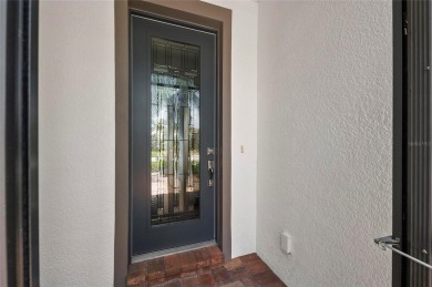 Stunning Martin Ray Model with Upgrades Galore  WATERFRONT on Sarasota National Golf Club in Florida - for sale on GolfHomes.com, golf home, golf lot