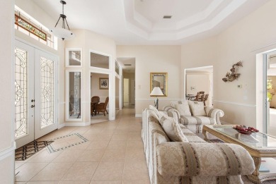 This TURN-KEY FURNISHED, custom-built pool home by Newport Homes on Rotonda Golf and Country Club The Links Course in Florida - for sale on GolfHomes.com, golf home, golf lot