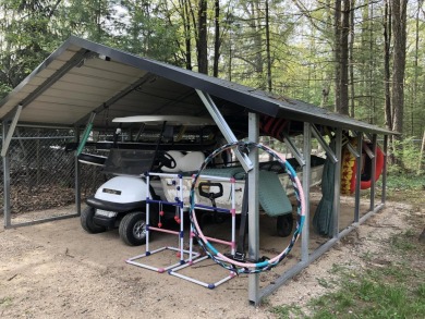 Located within a 5 minute drive of Higgins Lake South State Park on Ye Olde Country Club in Michigan - for sale on GolfHomes.com, golf home, golf lot