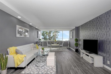 Stunning Resort-Style Condo with Designer Finishes and on Cove Cay Country Club in Florida - for sale on GolfHomes.com, golf home, golf lot