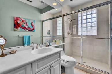 Golf course vistas fill this elegant custom 2-story 6 BD/5 BA on Woodfield Country Club in Florida - for sale on GolfHomes.com, golf home, golf lot