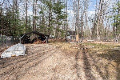 Located within a 5 minute drive of Higgins Lake South State Park on Ye Olde Country Club in Michigan - for sale on GolfHomes.com, golf home, golf lot