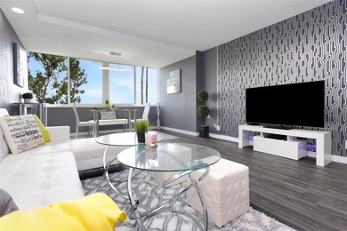 Stunning Resort-Style Condo with Designer Finishes and on Cove Cay Country Club in Florida - for sale on GolfHomes.com, golf home, golf lot