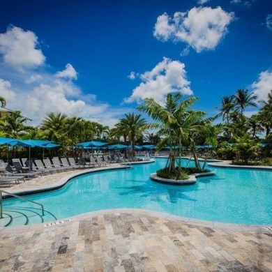 Golf course vistas fill this elegant custom 2-story 6 BD/5 BA on Woodfield Country Club in Florida - for sale on GolfHomes.com, golf home, golf lot