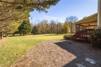 This 4-bedroom, 2.5-bath brick home is a perfect blend of on Sedgefield Golf Course in North Carolina - for sale on GolfHomes.com, golf home, golf lot