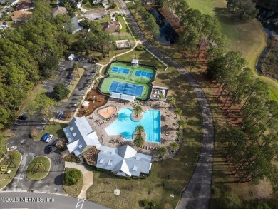 This home has the WOW factor! Luxury Upgrades in Private Gated on Cimarrone Golf and Country Club in Florida - for sale on GolfHomes.com, golf home, golf lot