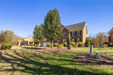 This 4-bedroom, 2.5-bath brick home is a perfect blend of on Sedgefield Golf Course in North Carolina - for sale on GolfHomes.com, golf home, golf lot