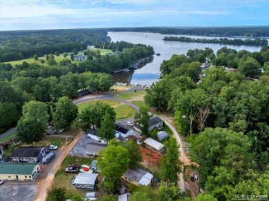 Cozy and character-filled nestled in a quiet lake community just on River Ridge Golf Club in Virginia - for sale on GolfHomes.com, golf home, golf lot