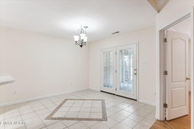 Freshly painted with hardwood floors in main living area on Knoxville Golf Course in Tennessee - for sale on GolfHomes.com, golf home, golf lot