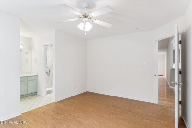 Freshly painted with hardwood floors in main living area on Knoxville Golf Course in Tennessee - for sale on GolfHomes.com, golf home, golf lot