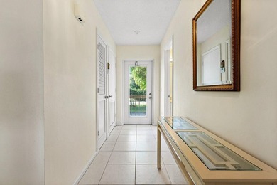 Breathtaking views of the lush golf course 9S, this spacious on Quail Ridge Golf Course and Country Club in Florida - for sale on GolfHomes.com, golf home, golf lot