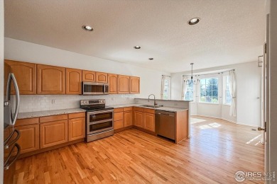 Bright, open and fresh in sought after Broadlands Community. On on The Broadlands Golf Course in Colorado - for sale on GolfHomes.com, golf home, golf lot