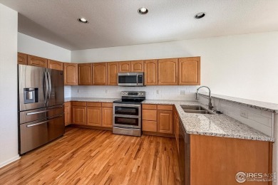 Bright, open and fresh in sought after Broadlands Community. On on The Broadlands Golf Course in Colorado - for sale on GolfHomes.com, golf home, golf lot