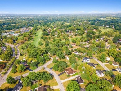 Welcome to this spacious 4-bedroom, 3-bath  ranch home with a on Worthington Hills Country Club in Ohio - for sale on GolfHomes.com, golf home, golf lot