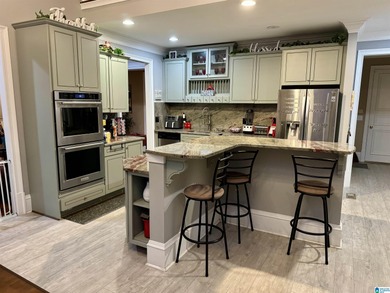 This magnificent residence offers an exceptional blend of luxury on Robert Trent Jones - Oxmoor Valley Golf Course in Alabama - for sale on GolfHomes.com, golf home, golf lot