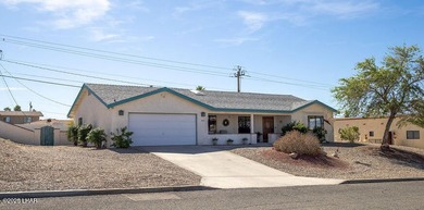 Welcome to this beautifully maintained 1,630 sq ft 2 bed, 2 bath on London Bridge Golf Course in Arizona - for sale on GolfHomes.com, golf home, golf lot