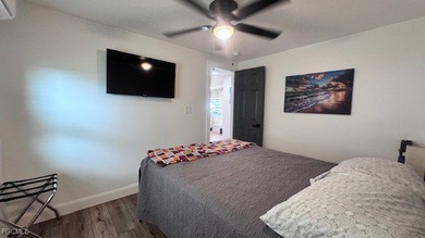 Experience luxury living in this beautifully remodeled on Riverbend Golf and Country Club in Florida - for sale on GolfHomes.com, golf home, golf lot