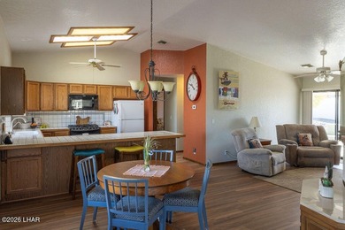 Welcome to this beautifully maintained 1,630 sq ft 2 bed, 2 bath on London Bridge Golf Course in Arizona - for sale on GolfHomes.com, golf home, golf lot