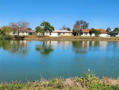 BEAUTIFUL LAKE VIEWS AND FLORIDA CHARM!This wonderful home on Duffys Golf Center in Florida - for sale on GolfHomes.com, golf home, golf lot