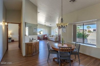 Welcome to this beautifully maintained 1,630 sq ft 2 bed, 2 bath on London Bridge Golf Course in Arizona - for sale on GolfHomes.com, golf home, golf lot