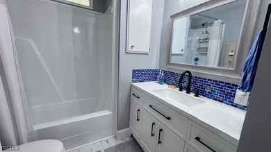 Experience luxury living in this beautifully remodeled on Riverbend Golf and Country Club in Florida - for sale on GolfHomes.com, golf home, golf lot