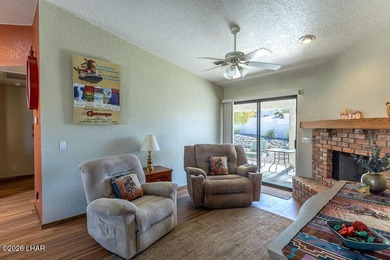 Welcome to this beautifully maintained 1,630 sq ft 2 bed, 2 bath on London Bridge Golf Course in Arizona - for sale on GolfHomes.com, golf home, golf lot