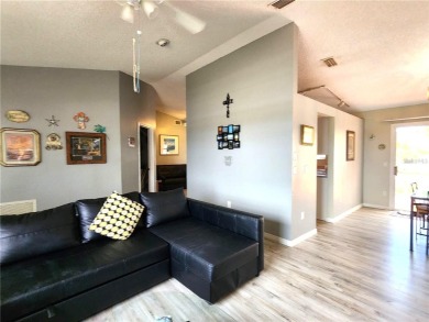 BEAUTIFUL LAKE VIEWS AND FLORIDA CHARM!This wonderful home on Duffys Golf Center in Florida - for sale on GolfHomes.com, golf home, golf lot
