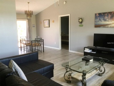 BEAUTIFUL LAKE VIEWS AND FLORIDA CHARM!This wonderful home on Duffys Golf Center in Florida - for sale on GolfHomes.com, golf home, golf lot