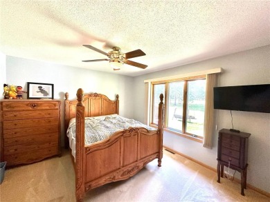 This impressive 3-bedroom, 2-bathroom home proudly overlooks the on Headwaters Country Club in Minnesota - for sale on GolfHomes.com, golf home, golf lot